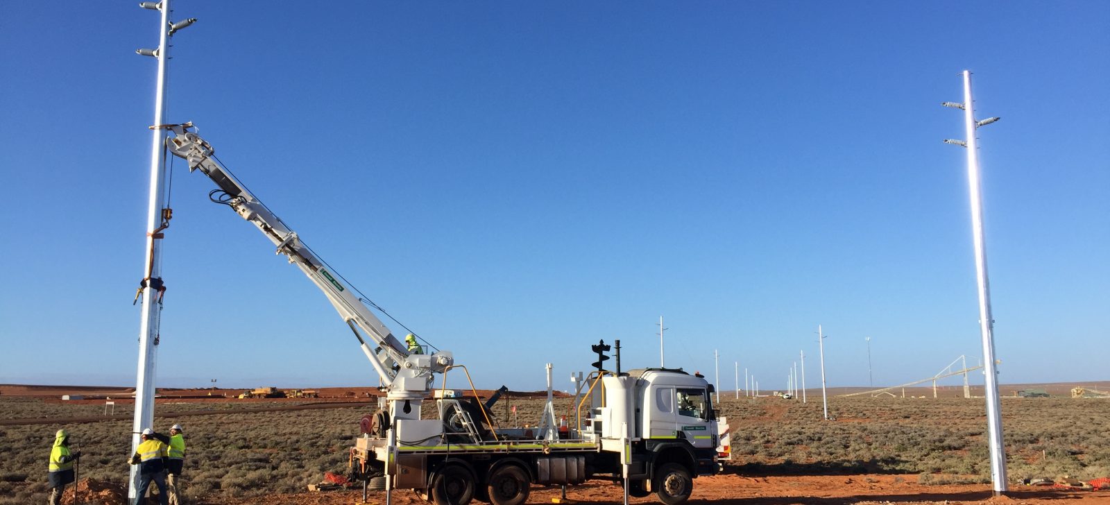 Cowell Truck putting pole in place